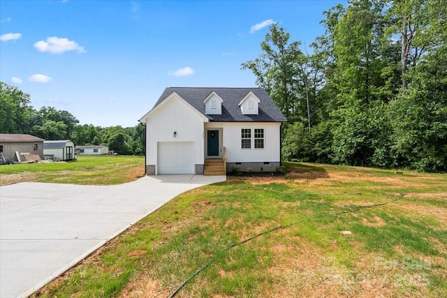 2906 Swicegood Rd, Linwood, NC 27299 - view of front of house featuring crawl space, concrete driveway, a front yard, and a garage