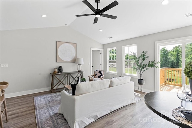 2906 Swicegood Rd, Linwood, NC 27299 - living room with ceiling fan, plenty of natural light, lofted ceiling, wood finished floors, and recessed lighting