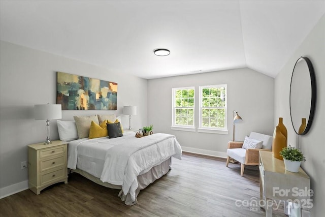 2906 Swicegood Rd, Linwood, NC 27299 - bedroom featuring dark wood-style flooring, baseboards, and lofted ceiling