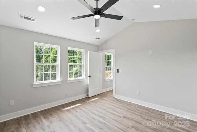 2906 Swicegood Rd, Linwood, NC 27299 - unfurnished room with a ceiling fan, baseboards, vaulted ceiling, recessed lighting, and wood finished floors