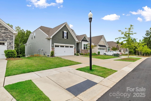 12637 Belmont Mansion Dr, Charlotte, NC 28273 - view of front of home featuring a front yard, a garage, concrete driveway, and stone siding