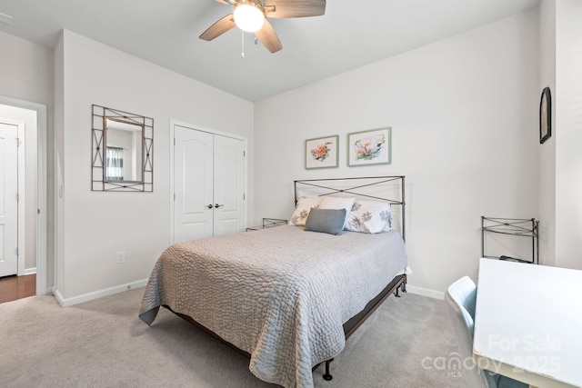 12637 Belmont Mansion Dr, Charlotte, NC 28273 - carpeted bedroom featuring a closet, baseboards, and a ceiling fan