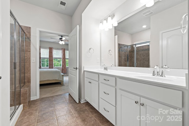12637 Belmont Mansion Dr, Charlotte, NC 28273 - bathroom featuring double vanity, a shower stall, ceiling fan, connected bathroom, and baseboards