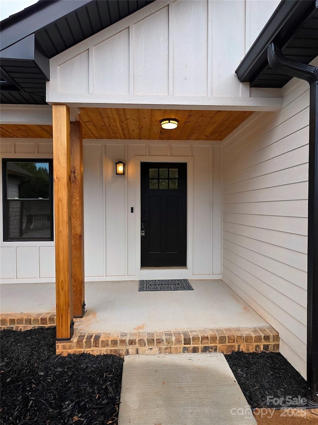 4364 Grover Pl, Granite Falls, NC 28630 - doorway to property featuring board and batten siding and a porch