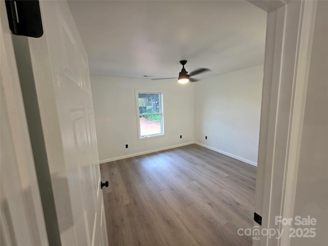 4364 Grover Pl, Granite Falls, NC 28630 - empty room featuring dark wood-style flooring and ceiling fan