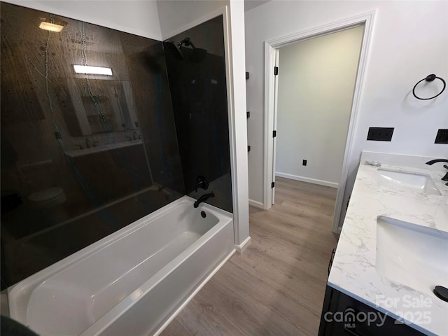4364 Grover Pl, Granite Falls, NC 28630 - full bathroom featuring wood finished floors, double vanity, and shower / tub combination