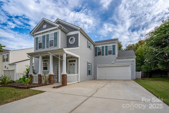 12719 Walking Stick Dr, Charlotte, NC 28278 - view of front of home featuring covered porch, concrete driveway, and an attached garage
