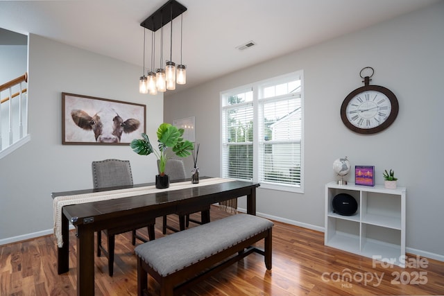 12719 Walking Stick Dr, Charlotte, NC 28278 - dining room featuring baseboards and wood finished floors