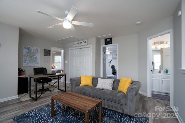 12719 Walking Stick Dr, Charlotte, NC 28278 - living area featuring wood finished floors, an office area, attic access, and baseboards