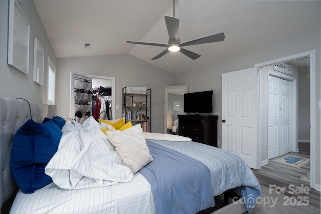 12719 Walking Stick Dr, Charlotte, NC 28278 - bedroom with wood finished floors, lofted ceiling, a closet, and ceiling fan