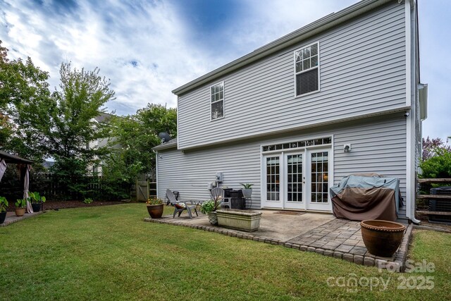 12719 Walking Stick Dr, Charlotte, NC 28278 - rear view of property featuring a patio and french doors