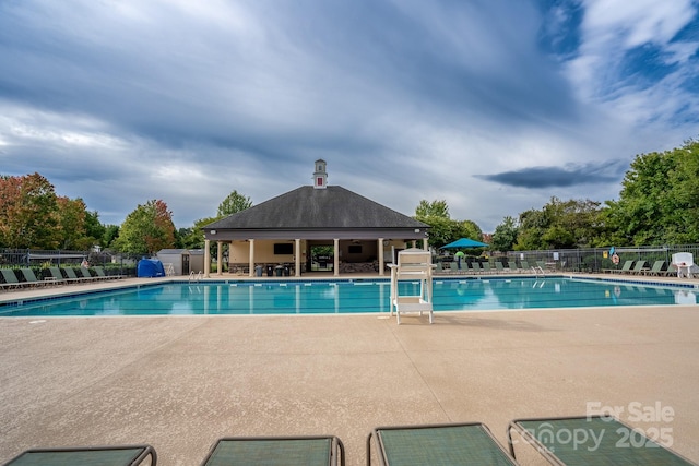 12719 Walking Stick Dr, Charlotte, NC 28278 - community pool featuring a patio