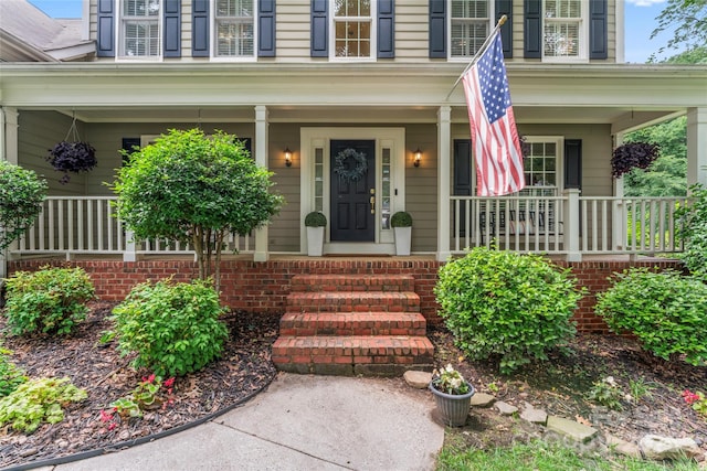 5233 Fairvista Dr, Charlotte, NC 28269 - view of exterior entry featuring covered porch