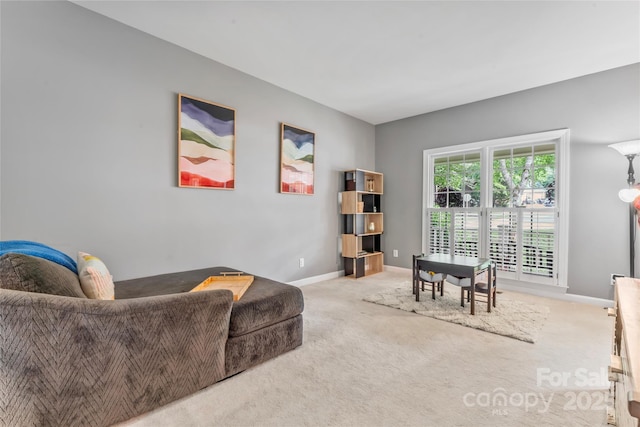 5233 Fairvista Dr, Charlotte, NC 28269 - carpeted living area with baseboards