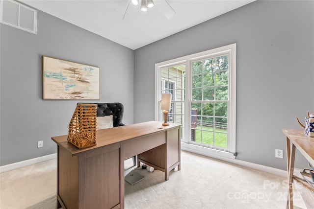5233 Fairvista Dr, Charlotte, NC 28269 - home office with light colored carpet, ceiling fan, and baseboards