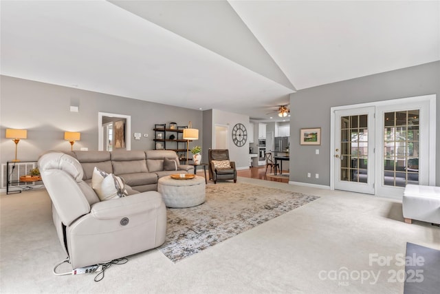 5233 Fairvista Dr, Charlotte, NC 28269 - living room with carpet floors, lofted ceiling, ceiling fan, and baseboards