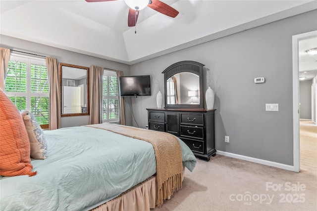 5233 Fairvista Dr, Charlotte, NC 28269 - bedroom with light colored carpet, baseboards, vaulted ceiling, and a ceiling fan