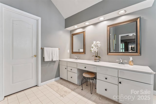 5233 Fairvista Dr, Charlotte, NC 28269 - full bath featuring double vanity, vaulted ceiling, recessed lighting, baseboards, and marble finish flooring