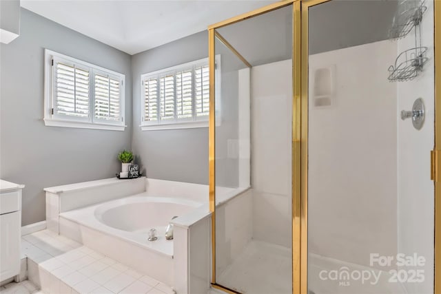 5233 Fairvista Dr, Charlotte, NC 28269 - bathroom with a shower stall, a garden tub, and vanity
