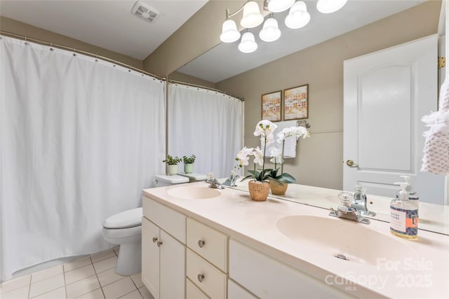 5233 Fairvista Dr, Charlotte, NC 28269 - bathroom with toilet, double vanity, tile patterned flooring, a chandelier, and a shower with shower curtain