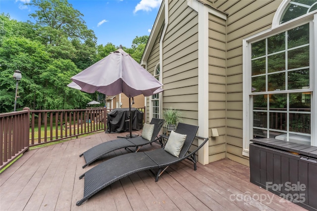 5233 Fairvista Dr, Charlotte, NC 28269 - wooden deck featuring a grill