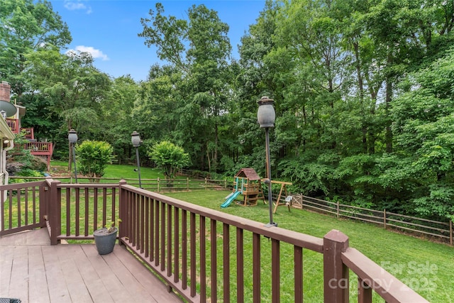 5233 Fairvista Dr, Charlotte, NC 28269 - wooden terrace featuring a playground