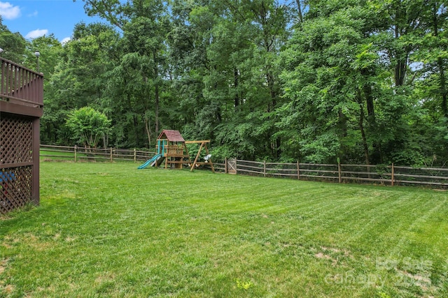 5233 Fairvista Dr, Charlotte, NC 28269 - view of yard featuring a playground and a view of trees