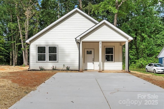 217 E Division Ave, East Spencer, NC 28039 - bungalow-style home featuring a porch and board and batten siding