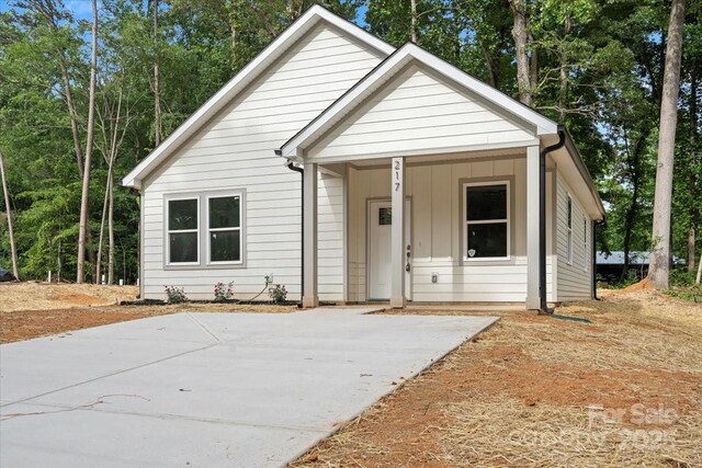 217 E Division Ave, East Spencer, NC 28039 - view of front facade with board and batten siding