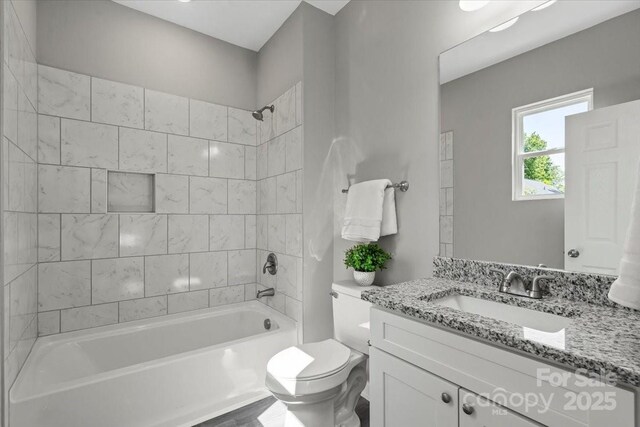 217 E Division Ave, East Spencer, NC 28039 - full bath featuring vanity, bathtub / shower combination, and toilet