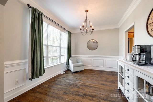 1648 Jonesberry Dr, Rock Hill, SC 29732 - living area with a chandelier, ornamental molding, wainscoting, and dark wood-style floors