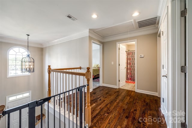 1648 Jonesberry Dr, Rock Hill, SC 29732 - corridor with attic access, an upstairs landing, dark wood-style flooring, crown molding, and baseboards