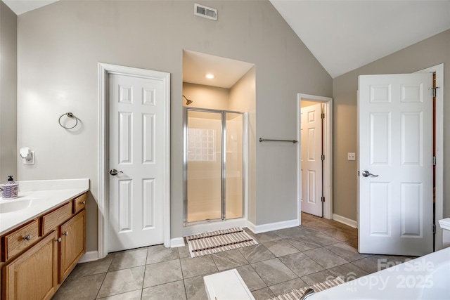 1648 Jonesberry Dr, Rock Hill, SC 29732 - bathroom with vaulted ceiling, a shower stall, vanity, and baseboards