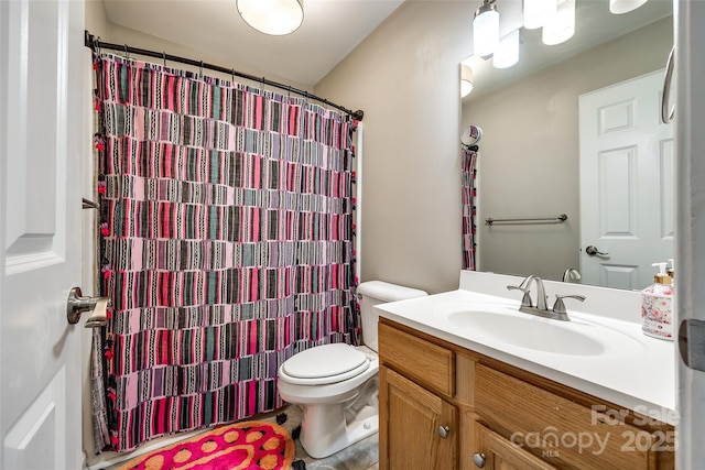 1648 Jonesberry Dr, Rock Hill, SC 29732 - bathroom featuring vanity, toilet, a shower with shower curtain, and tile patterned flooring