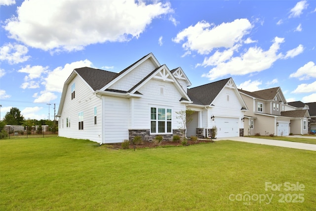 3924 Dahlia Dr, Harrisburg, NC 28075 - craftsman-style house with concrete driveway, stone siding, and an attached garage