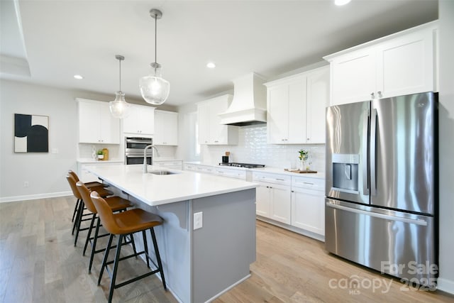 3924 Dahlia Dr, Harrisburg, NC 28075 - kitchen featuring stainless steel appliances, custom exhaust hood, a sink, recessed lighting, and backsplash