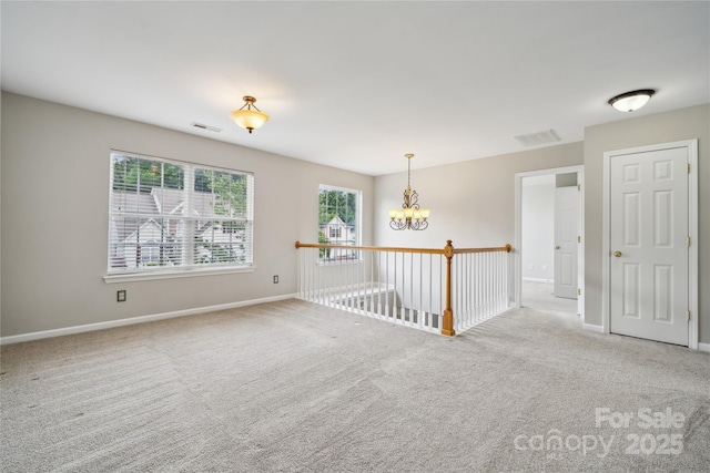 2028 Covered Bridge Ct, Rock Hill, SC 29732 - carpeted empty room featuring a chandelier and baseboards