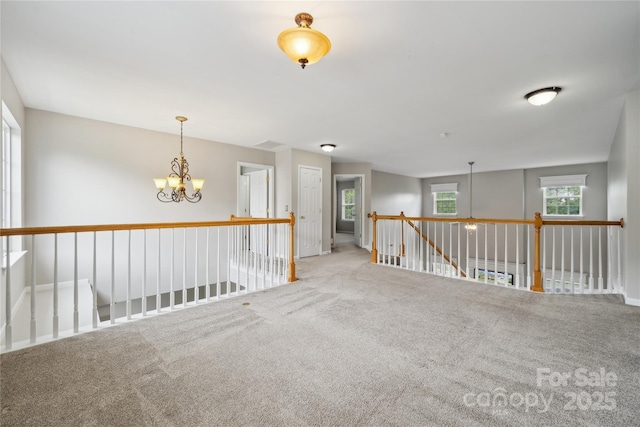 2028 Covered Bridge Ct, Rock Hill, SC 29732 - carpeted empty room featuring a chandelier and baseboards