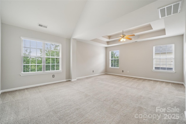 2028 Covered Bridge Ct, Rock Hill, SC 29732 - spare room featuring baseboards, ceiling fan, a tray ceiling, and carpet flooring