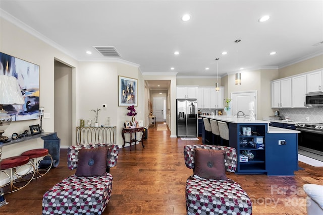 19004 Dry Narrows Way, Charlotte, NC 28278 - living area featuring recessed lighting, ornamental molding, and dark wood-style flooring