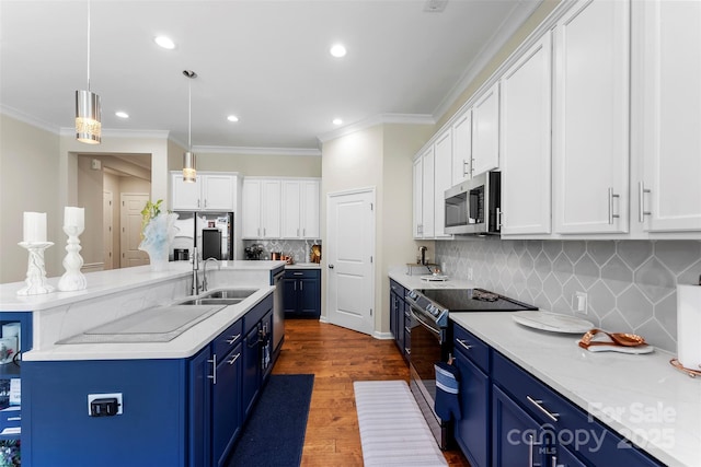 19004 Dry Narrows Way, Charlotte, NC 28278 - kitchen with appliances with stainless steel finishes, blue cabinetry, a sink, white cabinets, and recessed lighting