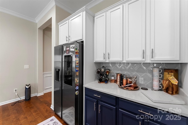 19004 Dry Narrows Way, Charlotte, NC 28278 - kitchen with stainless steel fridge with ice dispenser, blue cabinetry, crown molding, white cabinetry, and backsplash