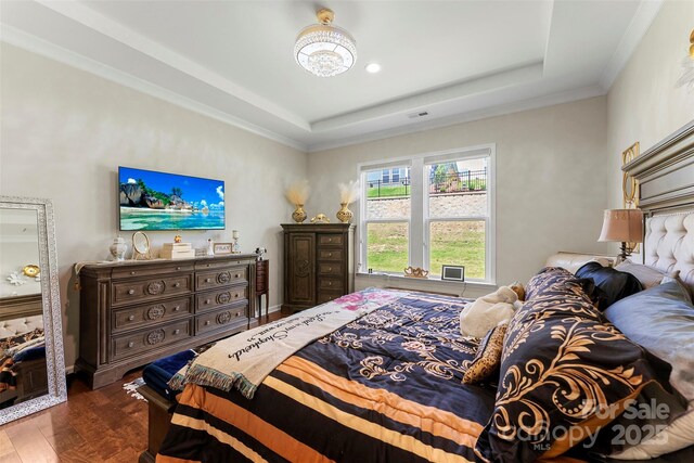 19004 Dry Narrows Way, Charlotte, NC 28278 - bedroom with a raised ceiling, dark wood-style floors, crown molding, recessed lighting, and a chandelier