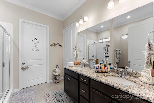 19004 Dry Narrows Way, Charlotte, NC 28278 - full bath with double vanity, a stall shower, baseboards, tile patterned floors, and crown molding