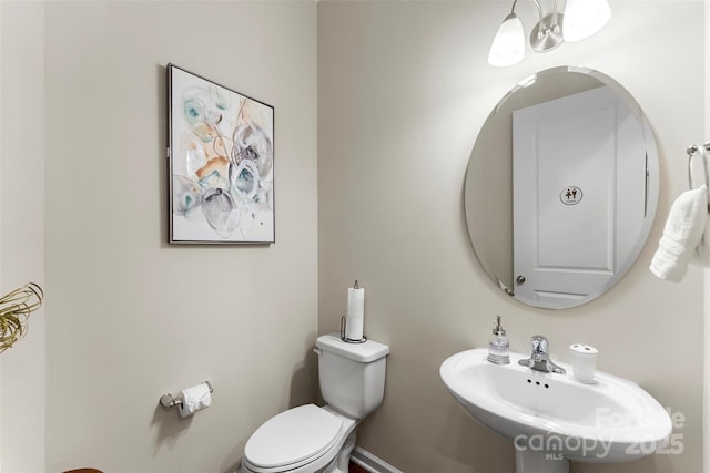 19004 Dry Narrows Way, Charlotte, NC 28278 - half bath with a sink, toilet, and baseboards