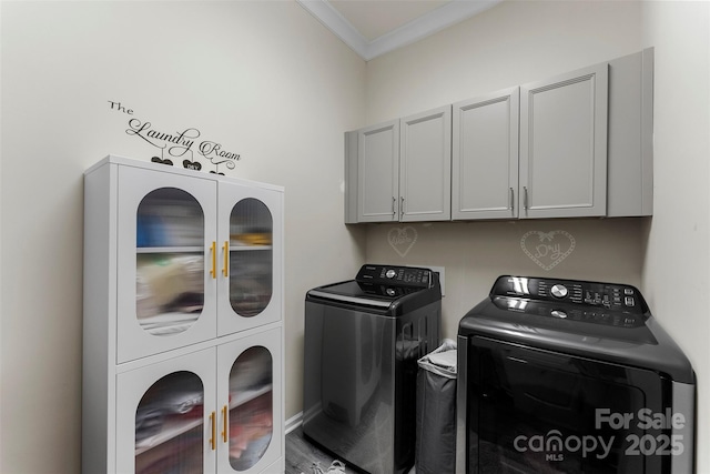 19004 Dry Narrows Way, Charlotte, NC 28278 - laundry area featuring washing machine and clothes dryer, crown molding, and cabinet space