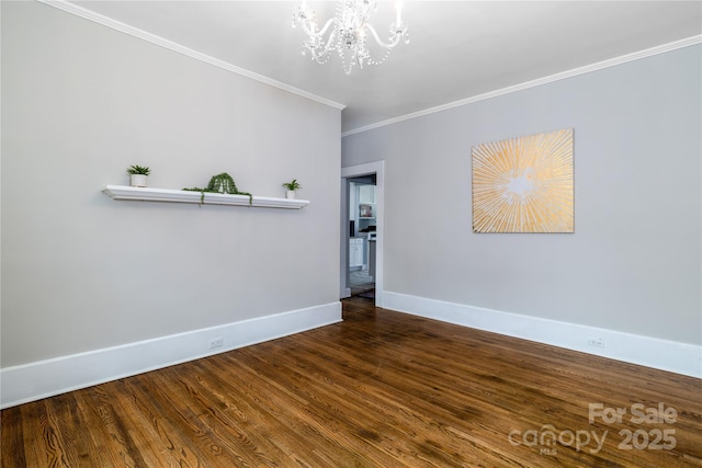 524 Hawthorne Ln, Charlotte, NC 28204 - unfurnished room with crown molding, baseboards, a chandelier, and wood finished floors