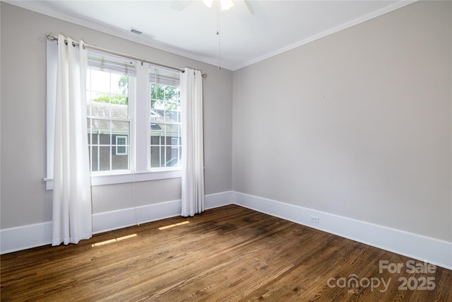524 Hawthorne Ln, Charlotte, NC 28204 - spare room featuring dark wood finished floors, ornamental molding, a ceiling fan, and baseboards