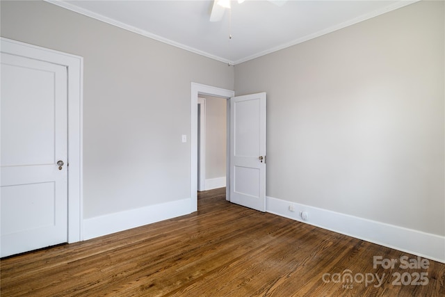 524 Hawthorne Ln, Charlotte, NC 28204 - unfurnished bedroom with dark wood-style floors, ornamental molding, baseboards, and a ceiling fan