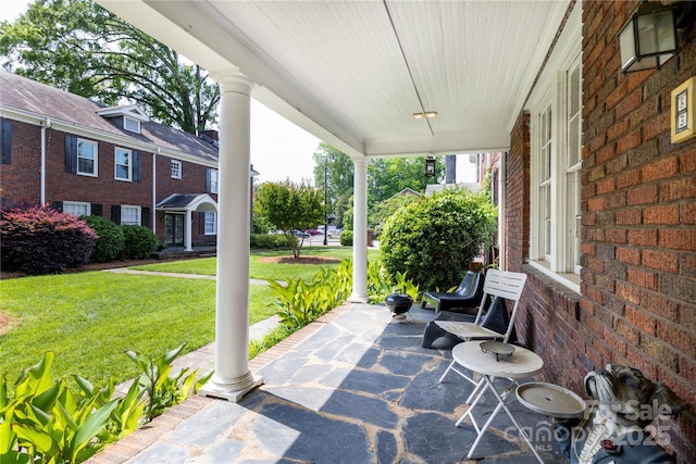 524 Hawthorne Ln, Charlotte, NC 28204 - porch with a lawn